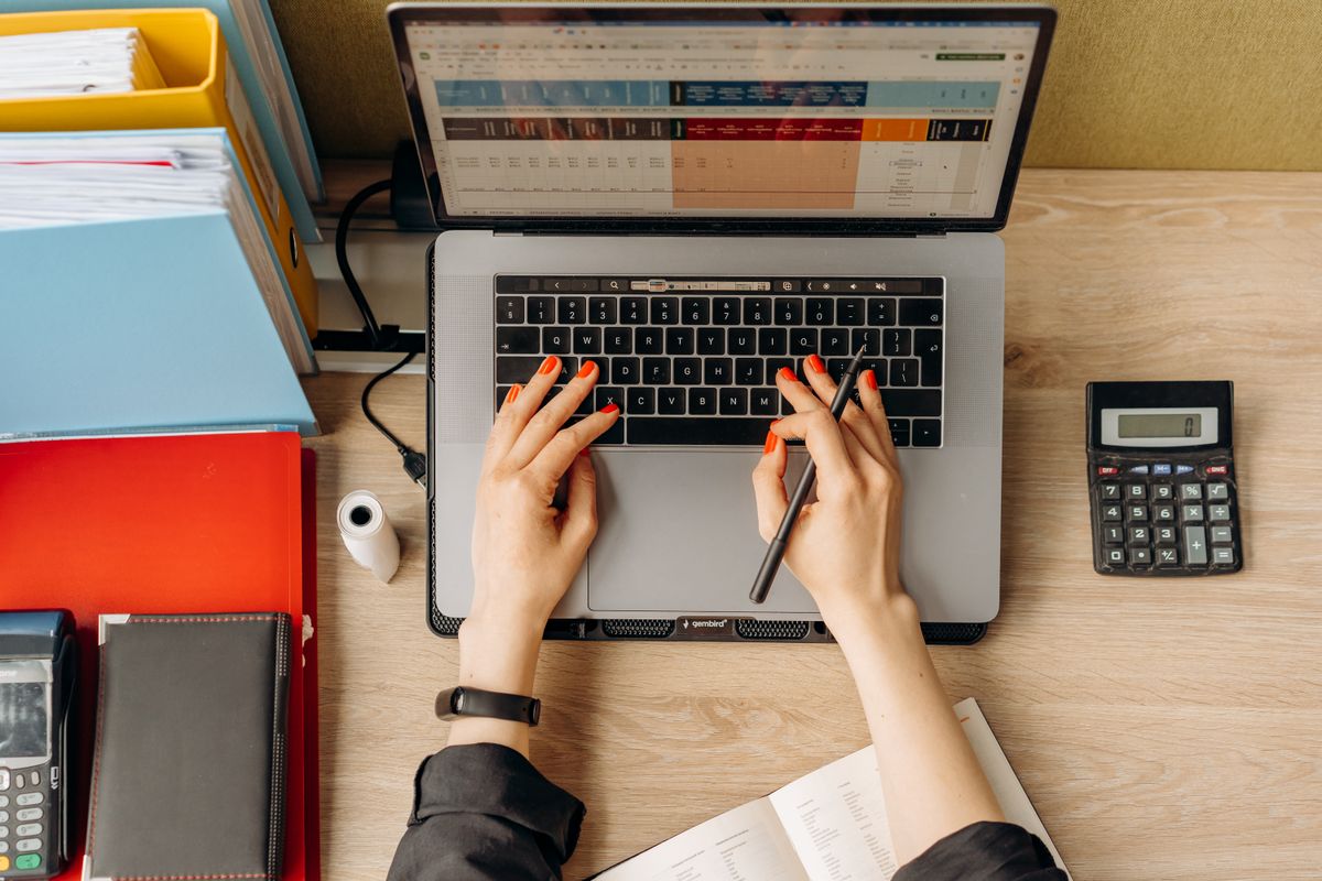 Working at a desk with a laptop